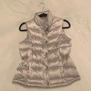 INC, shiny sliver material, has pockets